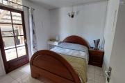A vendre une f4 sur un terrain de 555m2 a Sainte Clotilde.