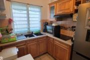 A vendre magnifique appartement F2 avec jardinet privatif dans r&eacute;sidence avec piscine le Tampon 400