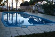A vendre magnifique appartement F2 avec jardinet privatif dans r&eacute;sidence avec piscine le Tampon 400